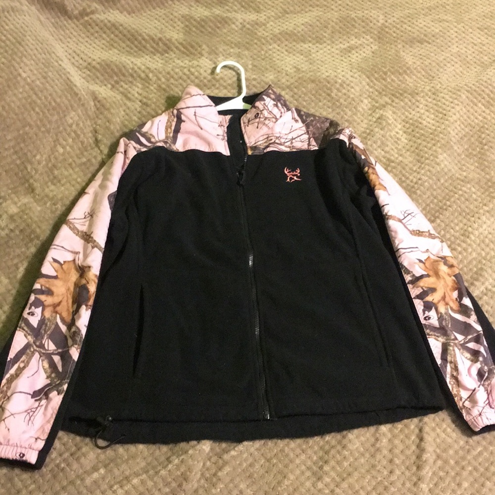 Woman’s pink and black fleece jacket